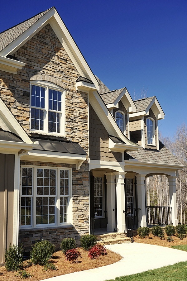 Ply Gem vinyl double hung windows with high performance Low-E insulated glass.