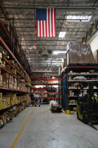 Warehouse with American flag hanging from the ceiling